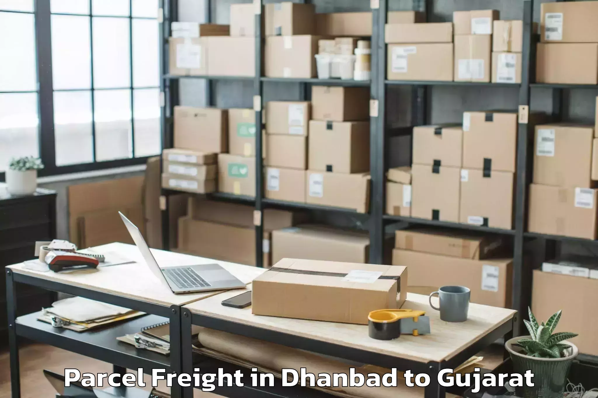 Book Your Dhanbad to Kadana Parcel Freight Today